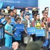 Supporters fill the stands behind Sanders.